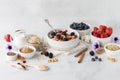 Steel cut oats hot cereal served with berries, seeds and walnuts ready for eating. Royalty Free Stock Photo