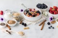 Steel cut oats served with blueberries, strawberries and walnuts ready for eating. Royalty Free Stock Photo