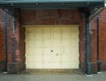 Steel door on red brick wall Royalty Free Stock Photo