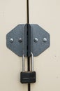 Steel doors secured by padlock