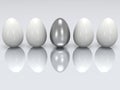 Steel egg in a row of the white eggs. 3D. Royalty Free Stock Photo