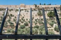 Steel fence in the Kidron Valley,  separating the Temple Mount from the Mount of Olives in Jerusalem, with Jewish graveyard and Royalty Free Stock Photo