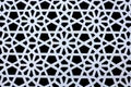 Steel flower white seamless pattern isolated on a black background.