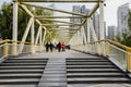 Steel footbridge in modern city of sunny winter afternoon