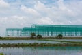 Steel frame building under construction and cloud blue sky, background Royalty Free Stock Photo