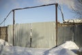 Steel gates. Gate in winter. Fence around the farm Royalty Free Stock Photo