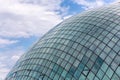 Steel and glass dome structure of the former Georgian Parliament Building in Kutaisi, with blue cloudy sky reflections Royalty Free Stock Photo