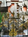 Steel gold-ornamented gate of a balinese hindu temple on Bali island in Indonesia