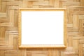 Steel gold picture frame decorative hanging on wood woven wall background