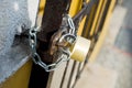 Steel grating closed by padlock