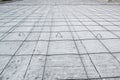 Steel grid placed on precast concrete floor Royalty Free Stock Photo