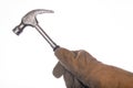 A steel hammer held in the hand. Accessories for locksmiths and welders