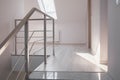 Steel handrail and marble stairs