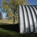 Steel hay storage building. Royalty Free Stock Photo
