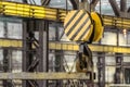 Steel hook with a traverse of industrial overhead crane Royalty Free Stock Photo