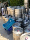 Steel industrial barrels of beer stocked in storage Royalty Free Stock Photo