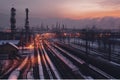 steel long pipes in crude oil factory during sunset Royalty Free Stock Photo