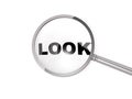 Steel magnifer with word look Royalty Free Stock Photo