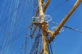 Steel masts of a sailing ship with the lowered sails. Royalty Free Stock Photo