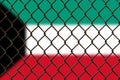 A steel mesh against the background of the flag Kuwait.