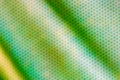 Steel mesh with green blur screen texture Royalty Free Stock Photo