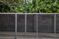 Steel mesh is used as temporary fence to mark boundaries of private property because it is durable and easy install as fence.