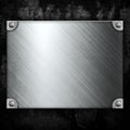 Steel metal plate on concrete wall Royalty Free Stock Photo