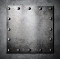 Steel metal square plate or hatch with rivets Royalty Free Stock Photo