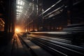 Steel mill interior, metal production stored in warehouse of metallurgical plant. Perspective inside dark storage of iron cast