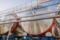 Steel modern cisterns for wine production on plant territory. Large tanks Royalty Free Stock Photo