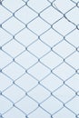 Steel net fence with blur background Royalty Free Stock Photo