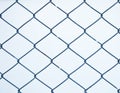 Steel net fence with blur background Royalty Free Stock Photo