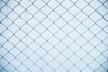 Steel net fence with blur background Royalty Free Stock Photo