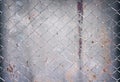 Steel net fence patterns texture on old gray zinc background