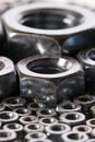 Steel nuts and screws on mirror Royalty Free Stock Photo