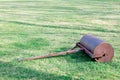 Steel old grass roller on grass yard