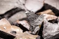 Steel ore, produced from iron ore, isolated black background Royalty Free Stock Photo