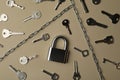 Steel padlock, keys and chains on beige background. Safety concept Royalty Free Stock Photo