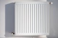 A steel panel heating radiator on a white wall Royalty Free Stock Photo