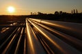 Steel pipeline system during sunset