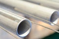 Steel pipes in beautiful fine steel wire suspended Royalty Free Stock Photo