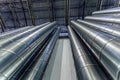 Steel pipes, parts for construction of ducts of industrial air condition system in warehouse. Bottom view Royalty Free Stock Photo