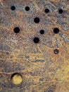 steel plate with some holes completely rusted, rust texture, red rust process, corrosion