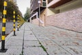 Steel Posts in Long Line on the City Street. Royalty Free Stock Photo