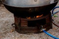 Steel pot on the gas stove with burning. Boiling pot on the gas stove fire. Red flame of gas stove heating large pot in kitchen. Royalty Free Stock Photo