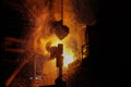 Steel production in electric furnaces. Sparks of molten steel. Electric arc furnace shop EAF. Metallurgical production, heavy