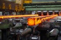 Steel production in electric furnaces. Sparks of molten steel. Electric arc furnace shop .