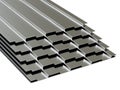 Steel profiled sheets stacked in stack. Sale of steel assortment. 3D Rendering Royalty Free Stock Photo
