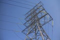 Steel pylon for high voltage power lines against blue sky