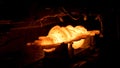 Steel quenching at high temperature in industrial furnace at the workshop of a forge plant. Scene. Process of cooling